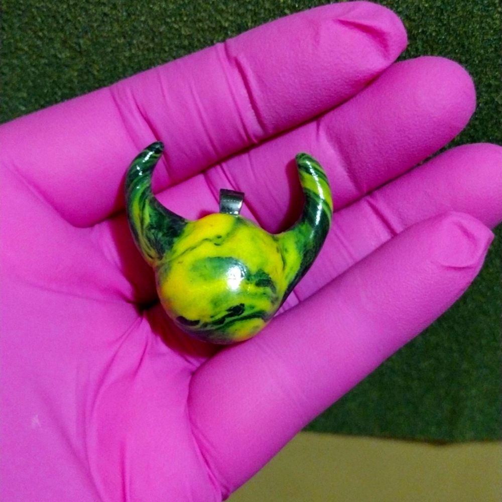 Hand sculpted horned ball